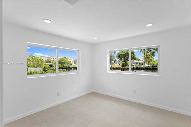 1710 SW 1st Ave, Pompano Beach, FL 33060 - unfurnished room featuring recessed lighting and a water view