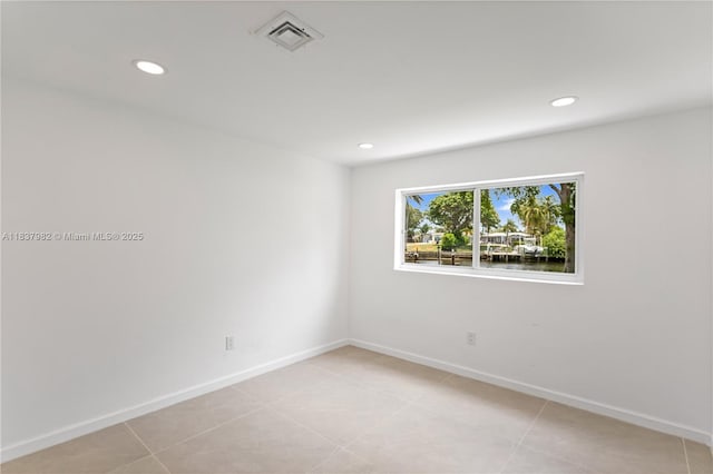 1710 SW 1st Ave, Pompano Beach, FL 33060 - empty room with recessed lighting and baseboards