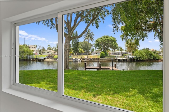 1710 SW 1st Ave, Pompano Beach, FL 33060 - dock area with a water view, a lawn, and a residential view