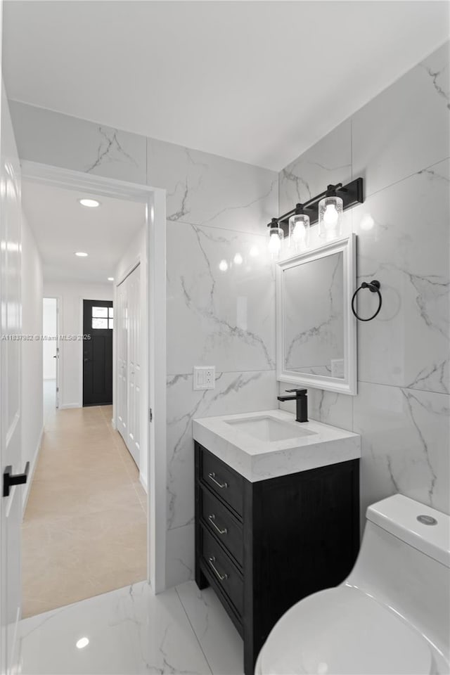 1710 SW 1st Ave, Pompano Beach, FL 33060 - bathroom with vanity and tile walls