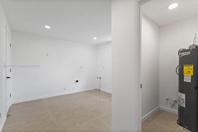 1710 SW 1st Ave, Pompano Beach, FL 33060 - washroom with water heater, electric dryer hookup, recessed lighting, and light tile patterned floors