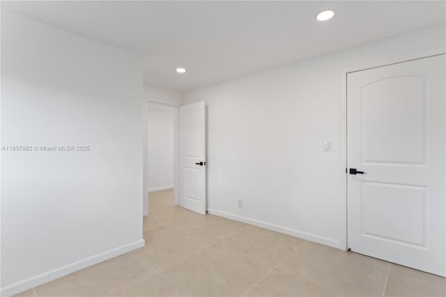 1710 SW 1st Ave, Pompano Beach, FL 33060 - unfurnished bedroom featuring recessed lighting and light tile patterned flooring