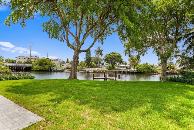 1710 SW 1st Ave, Pompano Beach, FL 33060 - dock area featuring a yard, a water view, and a residential view