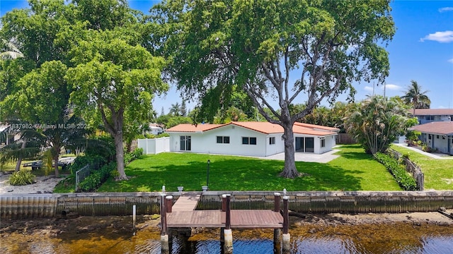 1710 SW 1st Ave, Pompano Beach, FL 33060 - rear view of house featuring a water view