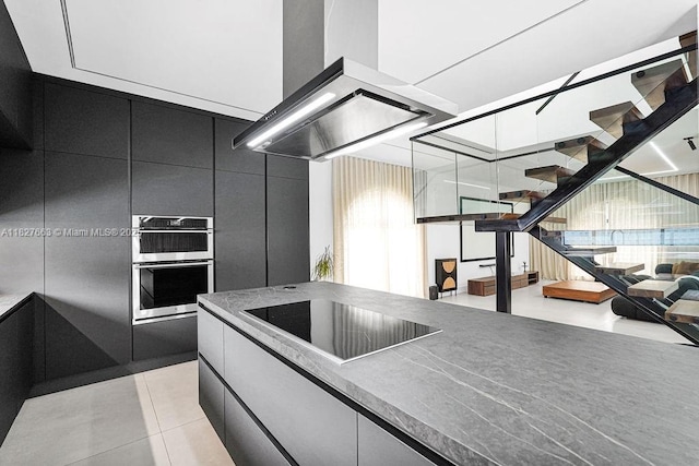 10746 Charleston Pl, Cooper City, FL 33026 - kitchen featuring island exhaust hood, black electric cooktop, stainless steel double oven, and modern cabinets