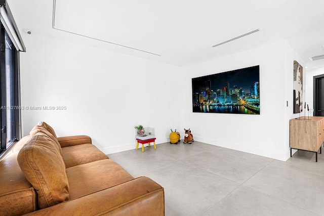 10746 Charleston Pl, Cooper City, FL 33026 - living area featuring concrete floors and baseboards