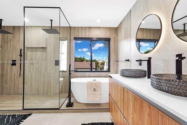 10746 Charleston Pl, Cooper City, FL 33026 - bathroom featuring a stall shower, vanity, and a freestanding bath