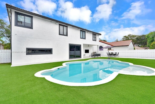 10746 Charleston Pl, Cooper City, FL 33026 - rear view of house featuring a fenced backyard, a patio area, stucco siding, and ceiling fan