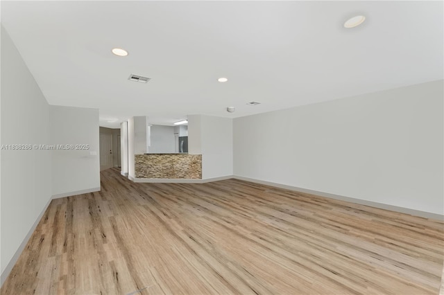10104 Royal Palm Blvd Unit 107-C, Coral Springs, FL 33065 - unfurnished room with light wood-style floors and recessed lighting