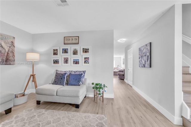 10104 Royal Palm Blvd Unit 107-C, Coral Springs, FL 33065 - sitting room featuring wood finished floors and baseboards