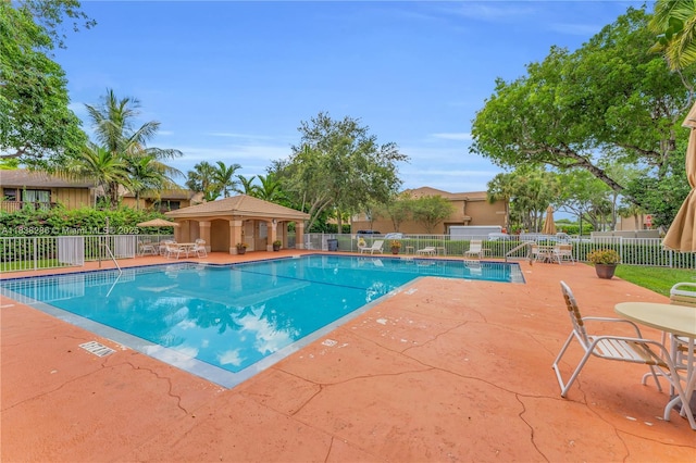 10104 Royal Palm Blvd Unit 107-C, Coral Springs, FL 33065 - community pool featuring a patio area