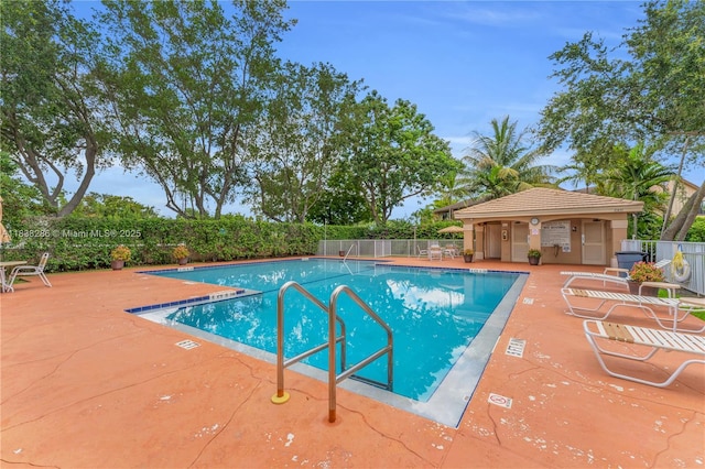 10104 Royal Palm Blvd Unit 107-C, Coral Springs, FL 33065 - community pool featuring a patio area