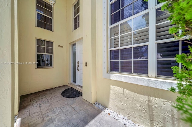 15281 Wilshire Ct, Pembroke Pines, FL 33027 - view of exterior entry featuring stucco siding