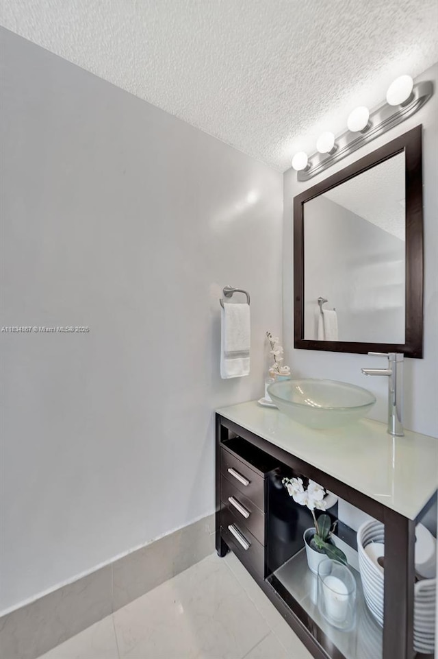 15281 Wilshire Ct, Pembroke Pines, FL 33027 - bathroom featuring a textured ceiling and vanity