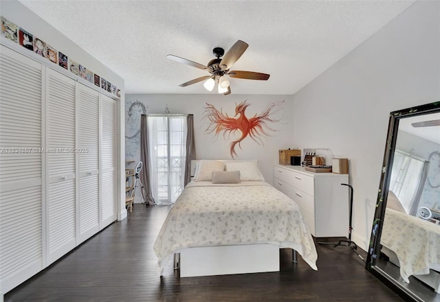 15281 Wilshire Ct, Pembroke Pines, FL 33027 - bedroom featuring a textured ceiling, a closet, dark wood-style floors, and a ceiling fan