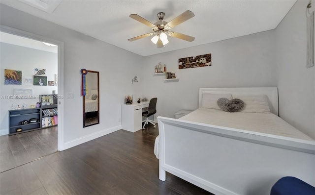 15281 Wilshire Ct, Pembroke Pines, FL 33027 - bedroom with dark wood-style floors, a desk, and a ceiling fan