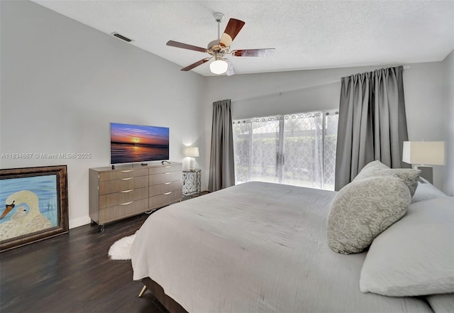 15281 Wilshire Ct, Pembroke Pines, FL 33027 - bedroom with lofted ceiling, dark wood-style flooring, a ceiling fan, and a textured ceiling