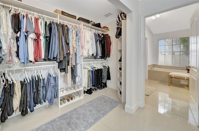 15281 Wilshire Ct, Pembroke Pines, FL 33027 - walk in closet with vaulted ceiling