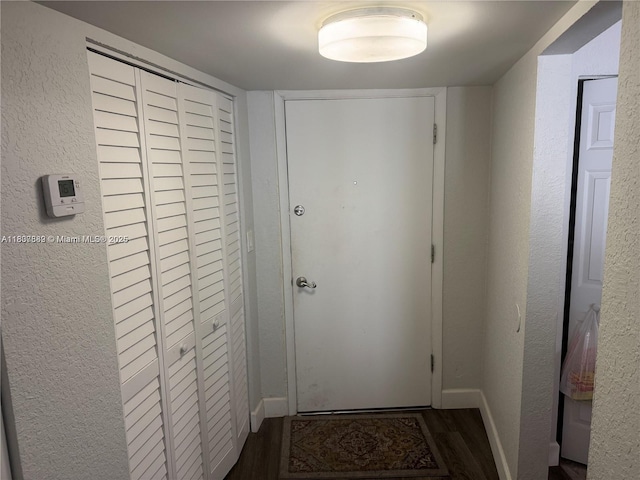 4235 N University Dr Unit 312, Sunrise, FL 33351 - corridor featuring wood finished floors and a textured wall