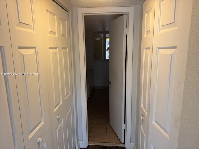 4235 N University Dr Unit 312, Sunrise, FL 33351 - corridor with dark tile patterned floors