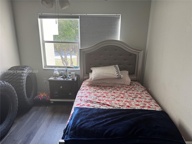 4235 N University Dr Unit 312, Sunrise, FL 33351 - bedroom featuring wood finished floors and a textured wall