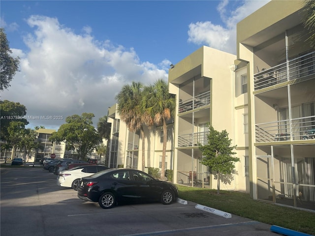4235 N University Dr Unit 312, Sunrise, FL 33351 - view of building exterior with uncovered parking