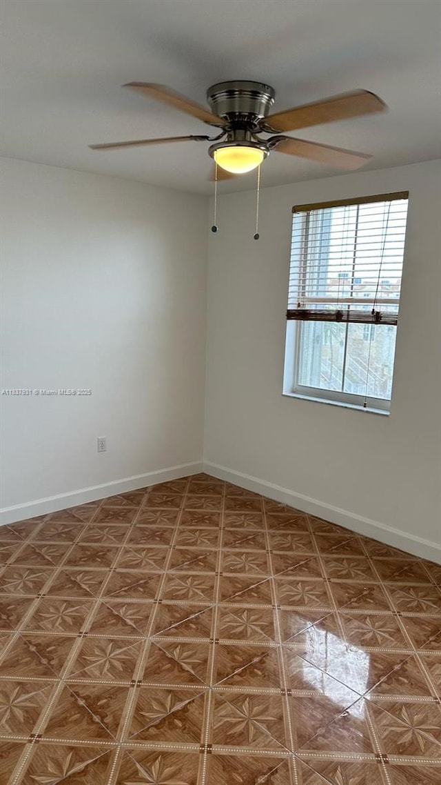8680 NW 3rd Ln Unit 303, Miami, FL 33126 - tiled spare room with a ceiling fan