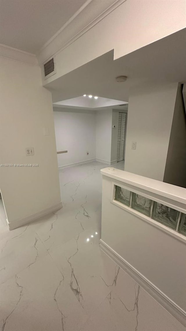 8680 NW 3rd Ln Unit 303, Miami, FL 33126 - unfurnished room featuring marble finish floors and crown molding