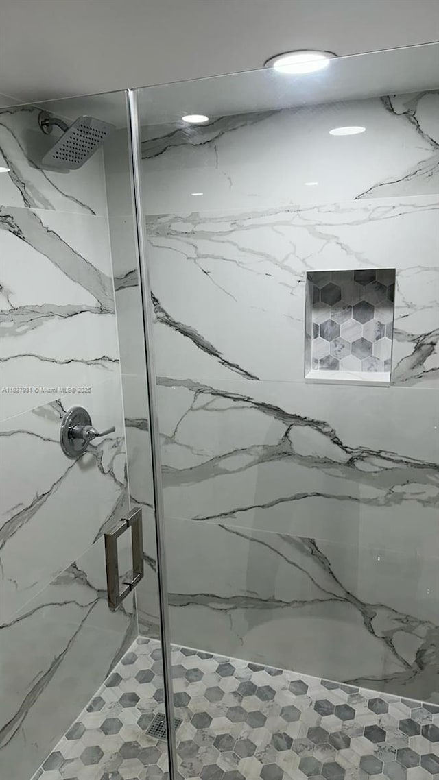 8680 NW 3rd Ln Unit 303, Miami, FL 33126 - bathroom featuring a marble finish shower