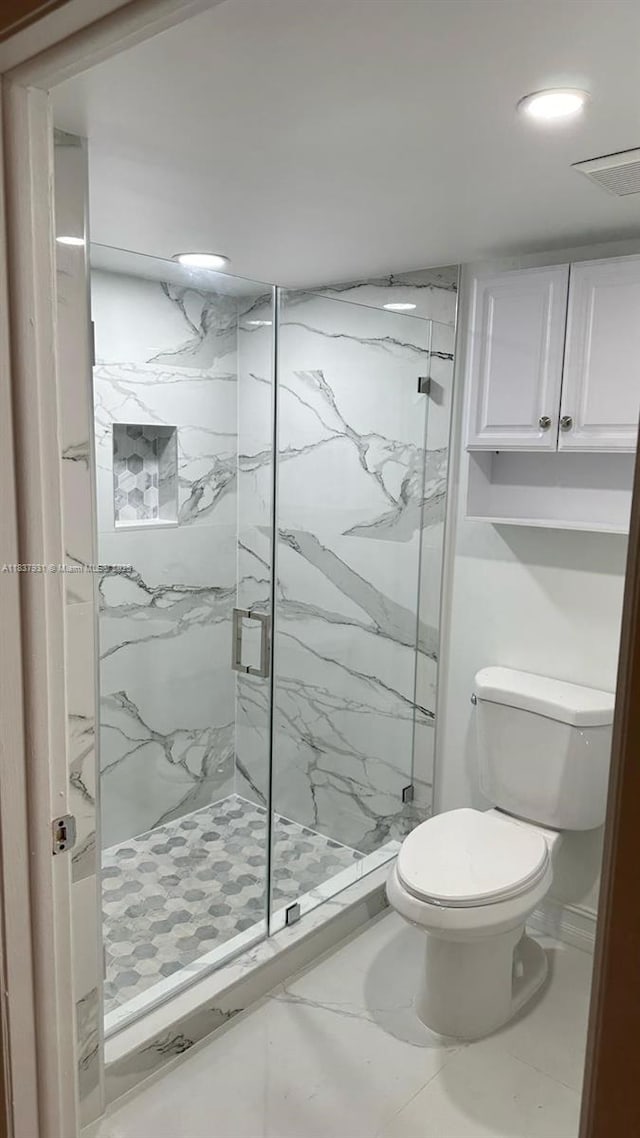 8680 NW 3rd Ln Unit 303, Miami, FL 33126 - bathroom featuring a marble finish shower and recessed lighting