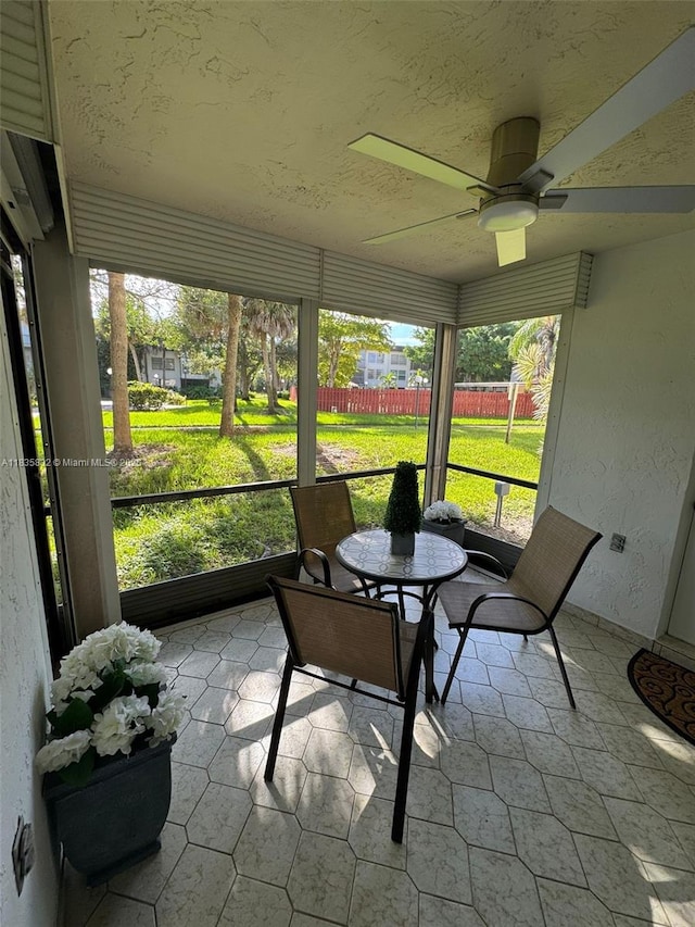 7480 NW 17th St Unit 103, Plantation, FL 33313 - sunroom / solarium featuring a ceiling fan and plenty of natural light