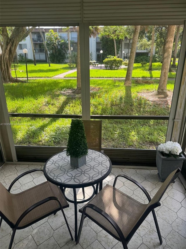 7480 NW 17th St Unit 103, Plantation, FL 33313 - sunroom featuring plenty of natural light