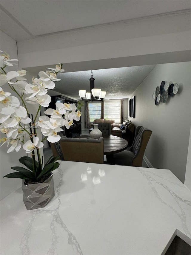 7480 NW 17th St Unit 103, Plantation, FL 33313 - dining room featuring a chandelier