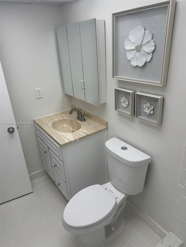 7480 NW 17th St Unit 103, Plantation, FL 33313 - half bathroom with vanity and tile patterned floors