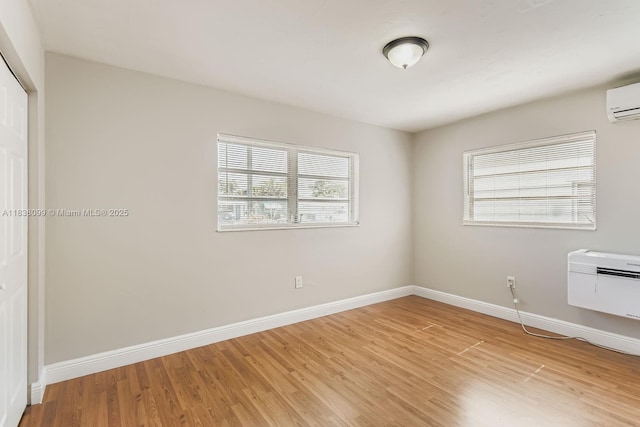 7904 Alhambra Blvd, Miramar, FL 33023 - spare room featuring light wood finished floors and a wall unit AC