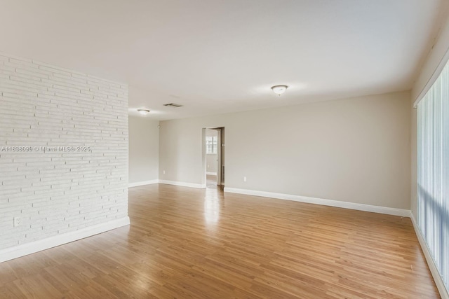 7904 Alhambra Blvd, Miramar, FL 33023 - unfurnished room featuring light wood-style flooring and baseboards
