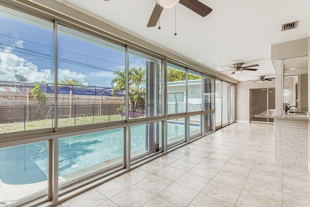 7904 Alhambra Blvd, Miramar, FL 33023 - unfurnished sunroom with tile patterned flooring and healthy amount of natural light