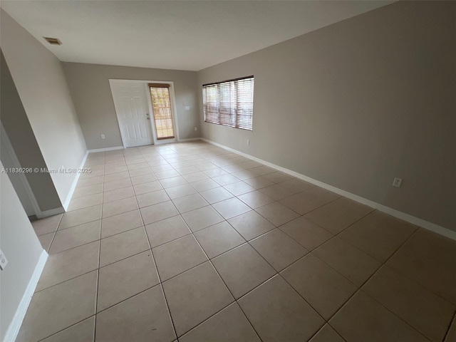 6865 SW 158th Pl, Miami, FL 33193 - unfurnished room featuring light tile patterned floors and baseboards
