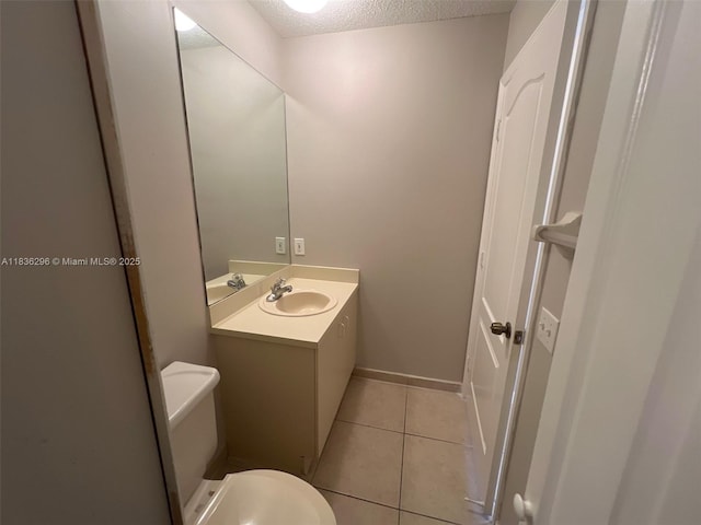 6865 SW 158th Pl, Miami, FL 33193 - half bathroom featuring tile patterned flooring, vanity, and a textured ceiling