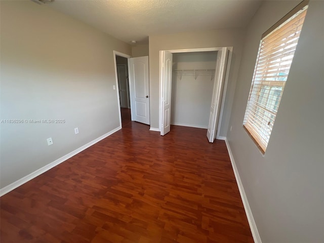 6865 SW 158th Pl, Miami, FL 33193 - unfurnished bedroom featuring wood finished floors and a closet