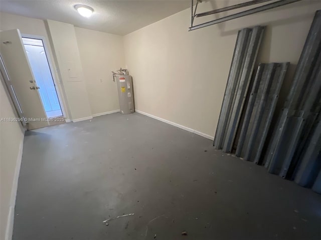 6865 SW 158th Pl, Miami, FL 33193 - garage featuring electric water heater and baseboards