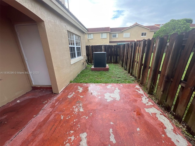 6865 SW 158th Pl, Miami, FL 33193 - fenced backyard featuring a patio area