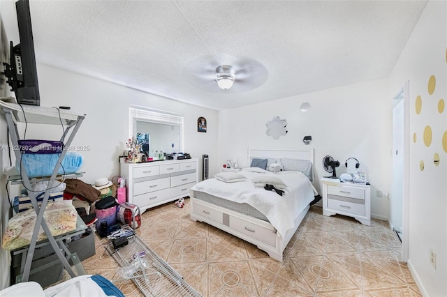 1178 NW 123rd Pl Unit 1210, Miami, FL 33182 - bedroom featuring light tile patterned floors, a ceiling fan, and a textured ceiling
