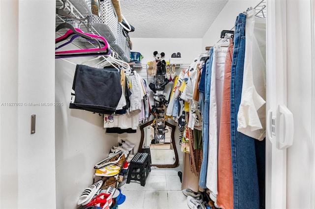 1178 NW 123rd Pl Unit 1210, Miami, FL 33182 - walk in closet featuring tile patterned floors