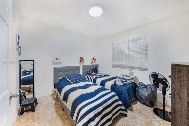 1178 NW 123rd Pl Unit 1210, Miami, FL 33182 - tiled bedroom featuring baseboards