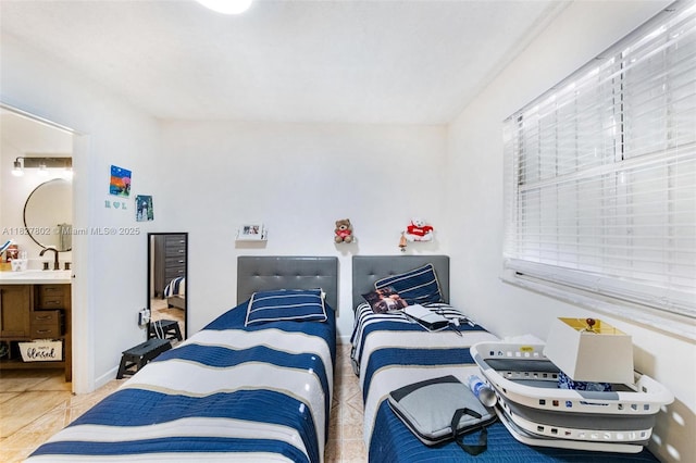 1178 NW 123rd Pl Unit 1210, Miami, FL 33182 - bedroom featuring tile patterned flooring and connected bathroom