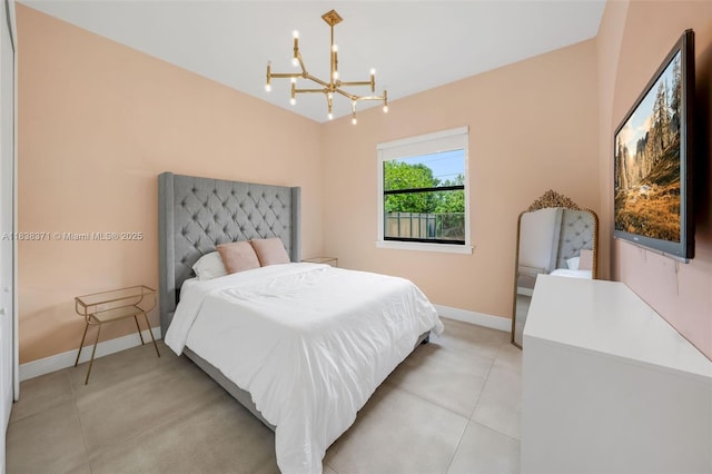 14832 SW 39th Ter, Miami, FL 33185 - bedroom featuring a chandelier and light tile patterned floors