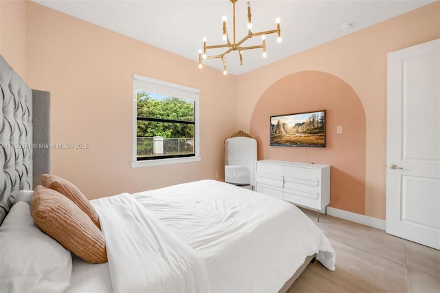 14832 SW 39th Ter, Miami, FL 33185 - bedroom featuring a chandelier and baseboards