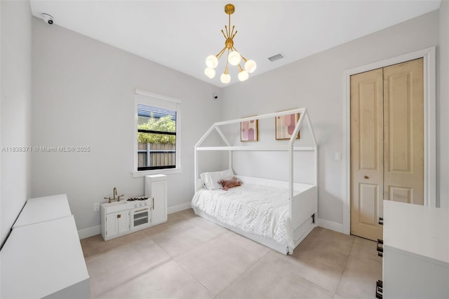 14832 SW 39th Ter, Miami, FL 33185 - bedroom with a chandelier and baseboards