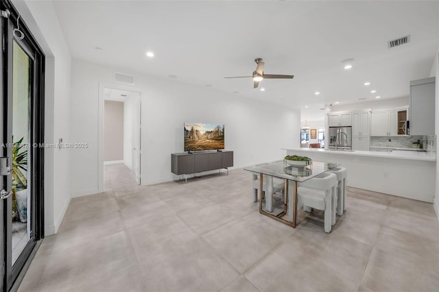 14832 SW 39th Ter, Miami, FL 33185 - dining area featuring ceiling fan, recessed lighting, and concrete flooring